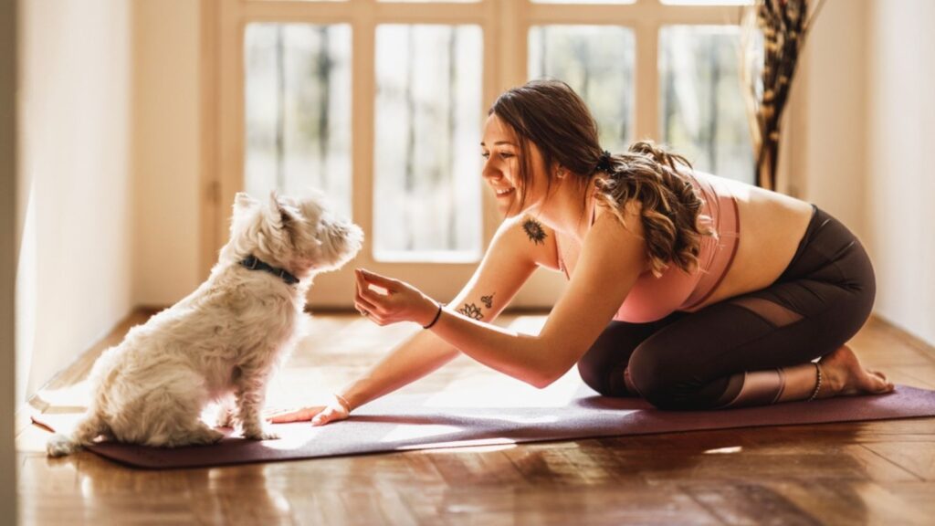 woman exercise yoga dog pet